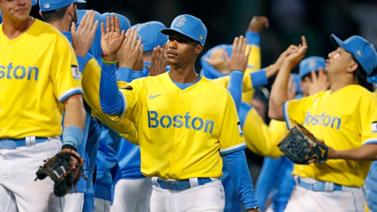 Red Sox unveil blue-and-yellow uniforms before Patriots' Day