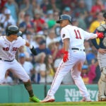Rafael Devers (right) celebrates a home run with Kiké Hernández.