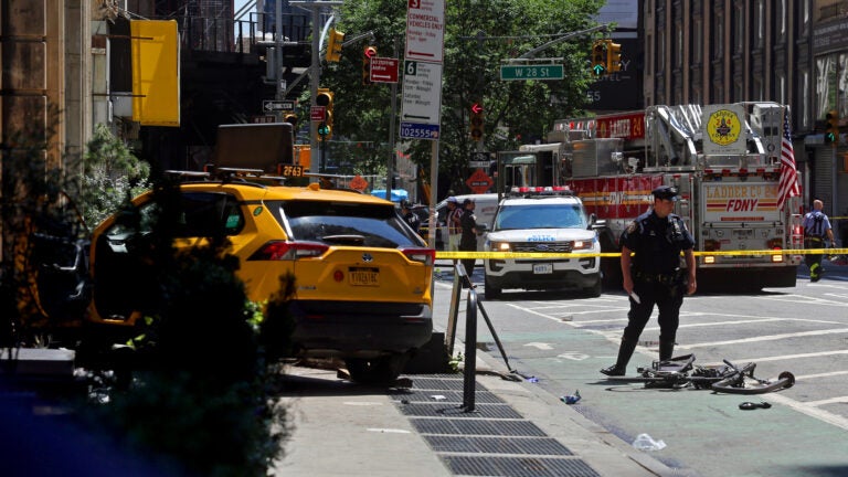 3 critically hurt when taxi jumps curb in Manhattan
