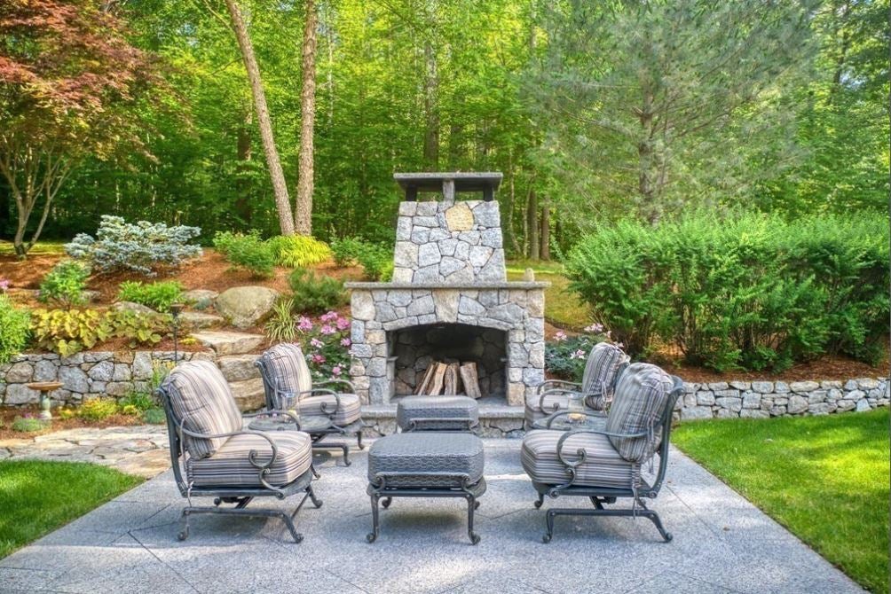 For $2.25m, Hopkinton home with waterfall, putting green, patios