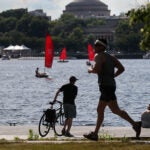 Boston weather -- , MA, 06/28/2022, Warm temperatures brought joggers, bikers, loungers and sailors out to the Charles River.