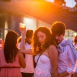 Attendees dance at the ICA's White Hot Sunset Waterfront Party