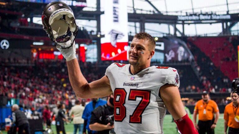 New England Patriots tight end Ron Gronkowski arrives on the field for  media day prior to Super Bowl XLVI in Indianapolis on January 31, 2012.  This is Gronkowski's first day without wearing