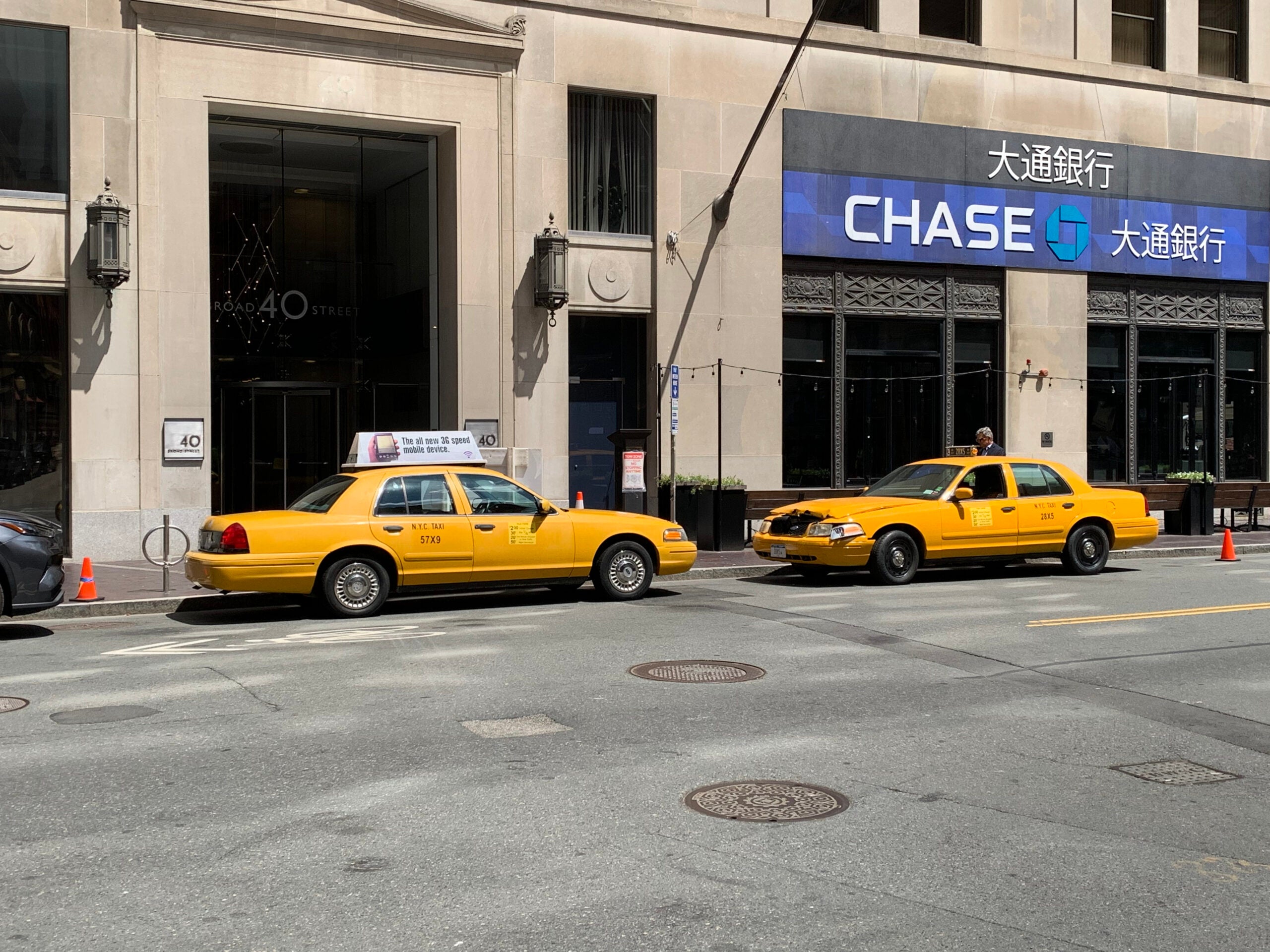 Two taxi cabs being used for filming the upcoming Sony-Marvel movie "Madame Web," which is currently filming in the Boston area through September.