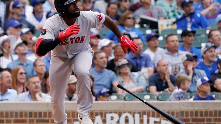 Red Sox hang on to beat Cubs