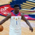 New Orleans Pelicans forward Zion Williamson moves the ball up court.