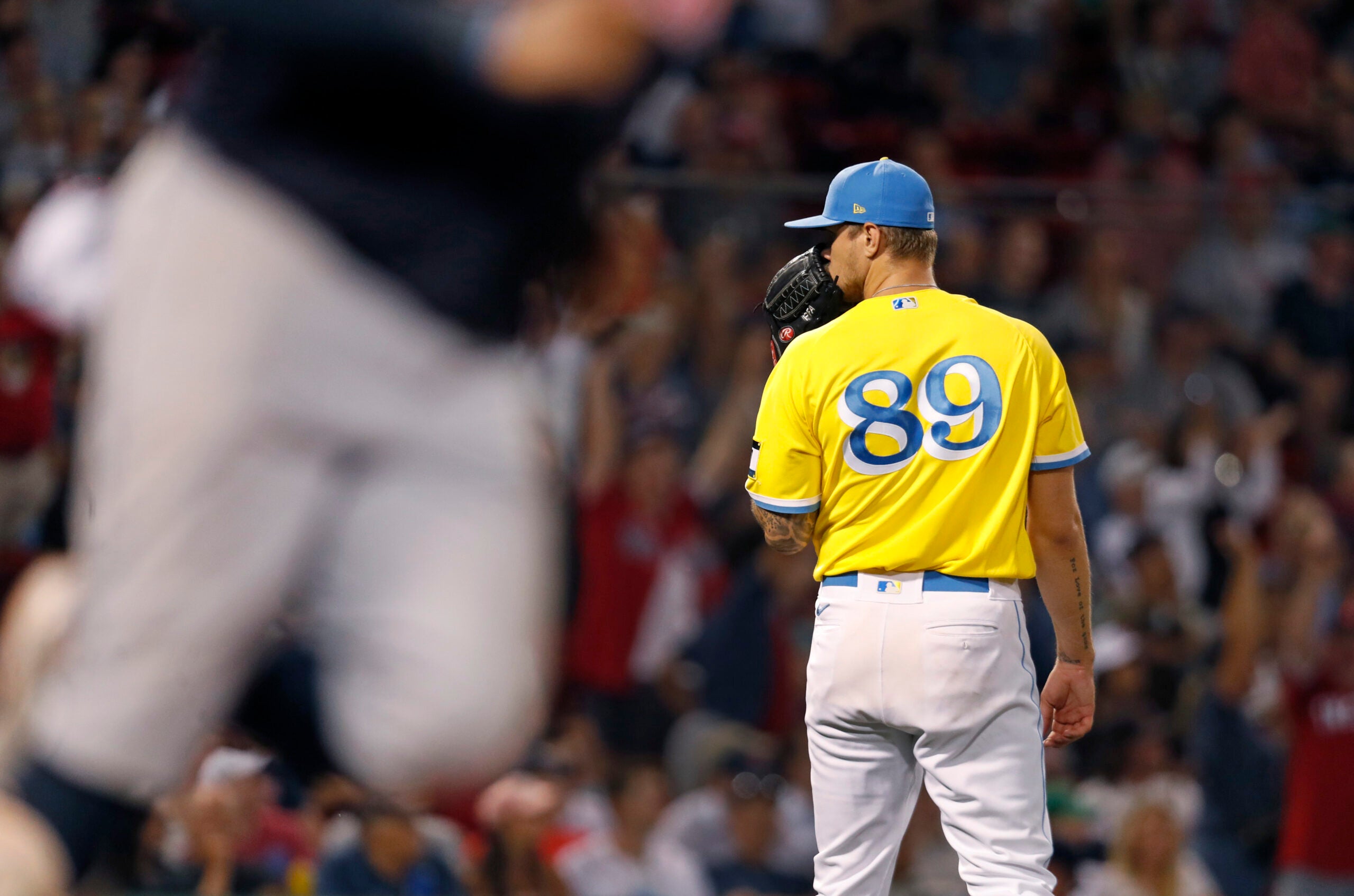 Red Sox unveil blue-and-yellow uniforms before Patriots' Day