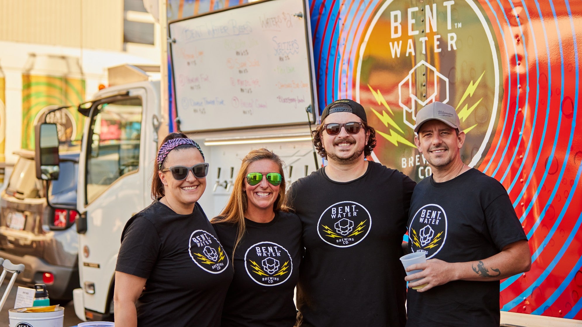 Bent Water Brewing employees tap truck