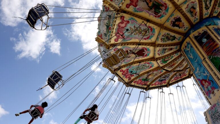 People took flight on an amusement ride at the Big E.