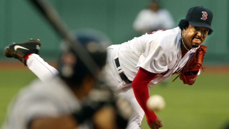 Red Sox legend Pedro Martinez hosts backpack giveaway in Boston