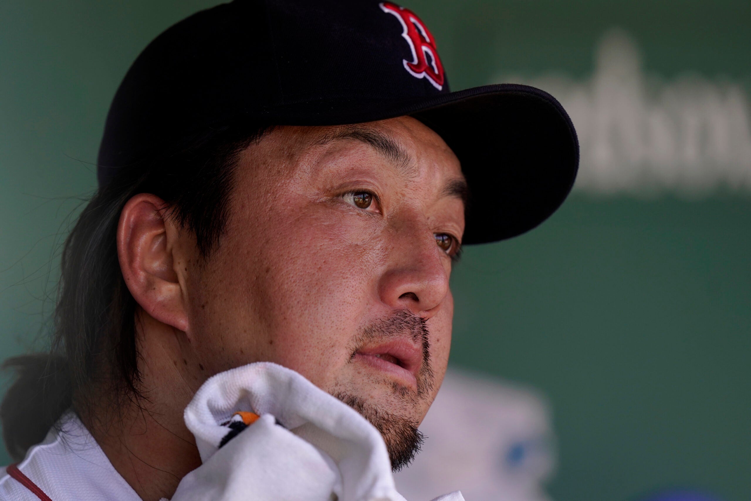 Hirokazu Sawamura looks on exasperated from the Red Sox dugout.