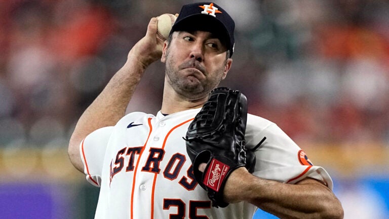Houston Astros starting pitcher Justin Verlander throws against the Minnesota Twins during the first inning of a baseball game Tuesday, Aug. 23, 2022, in Houston.