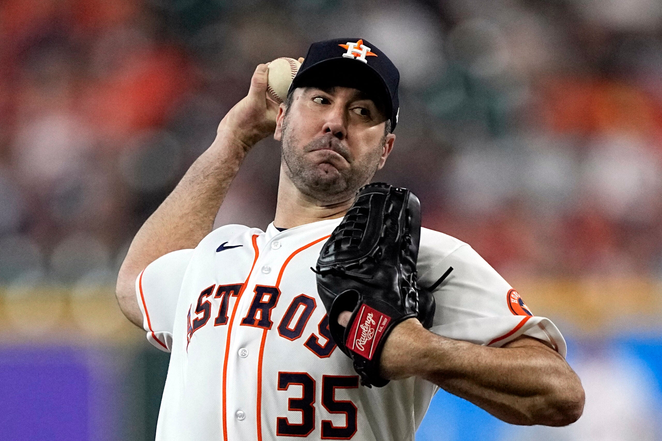 Houston Astros starting pitcher Justin Verlander throws against the Minnesota Twins during the first inning of a baseball game Tuesday, Aug. 23, 2022, in Houston.