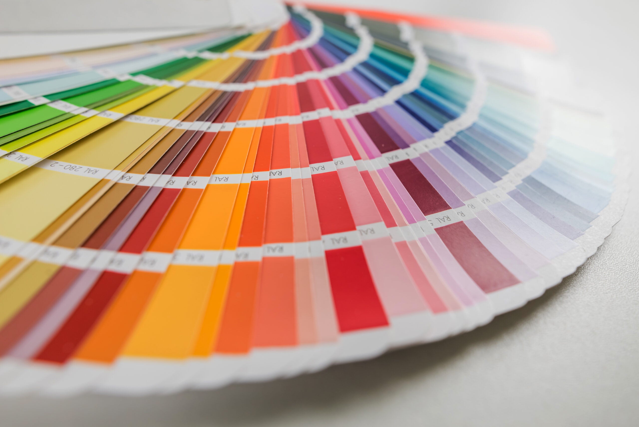 Fan of color samples. Catalog of rainbow color samples for design. Design concept