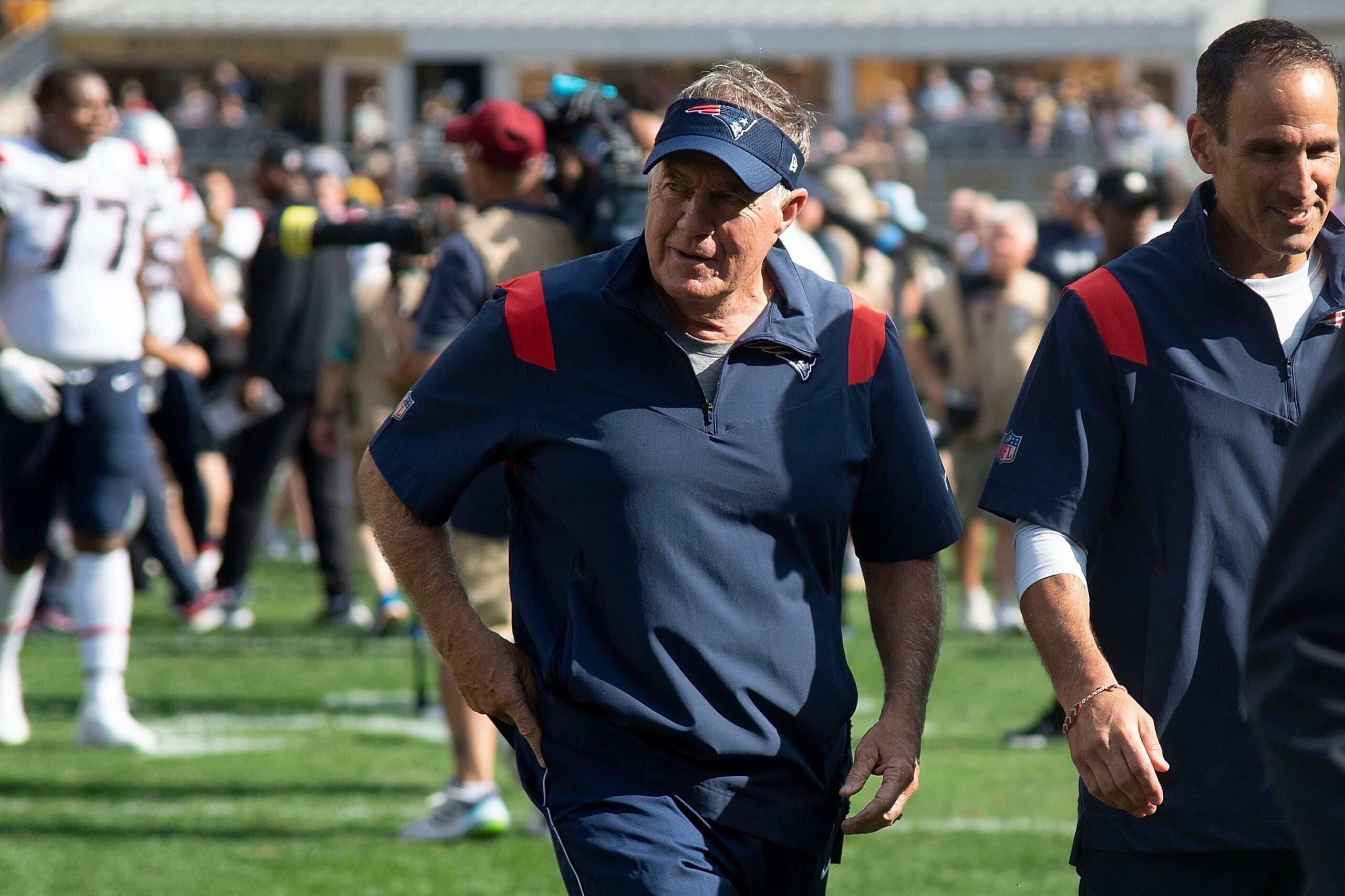 New England Patriots head coach Bill Belichick walks off the field following a 17-14 win over the Pittsburgh Steelers Sunday, Sept. 18, 2022.