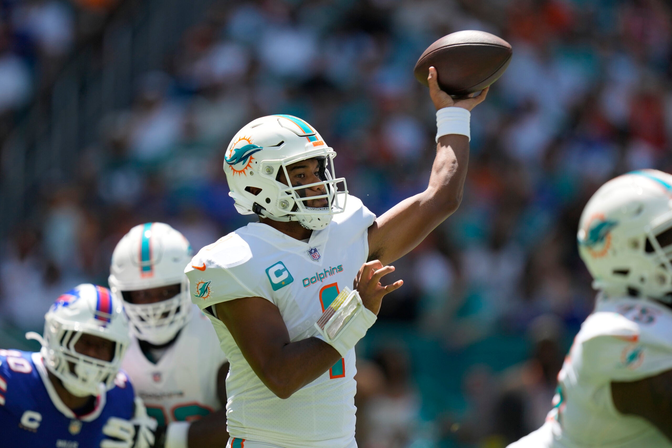 Miami Dolphins quarterback Tua Tagovailoa (1) aims a pass during the first half of an NFL football game against the Buffalo Bills, Sunday, Sept. 25, 2022, in Miami Gardens.