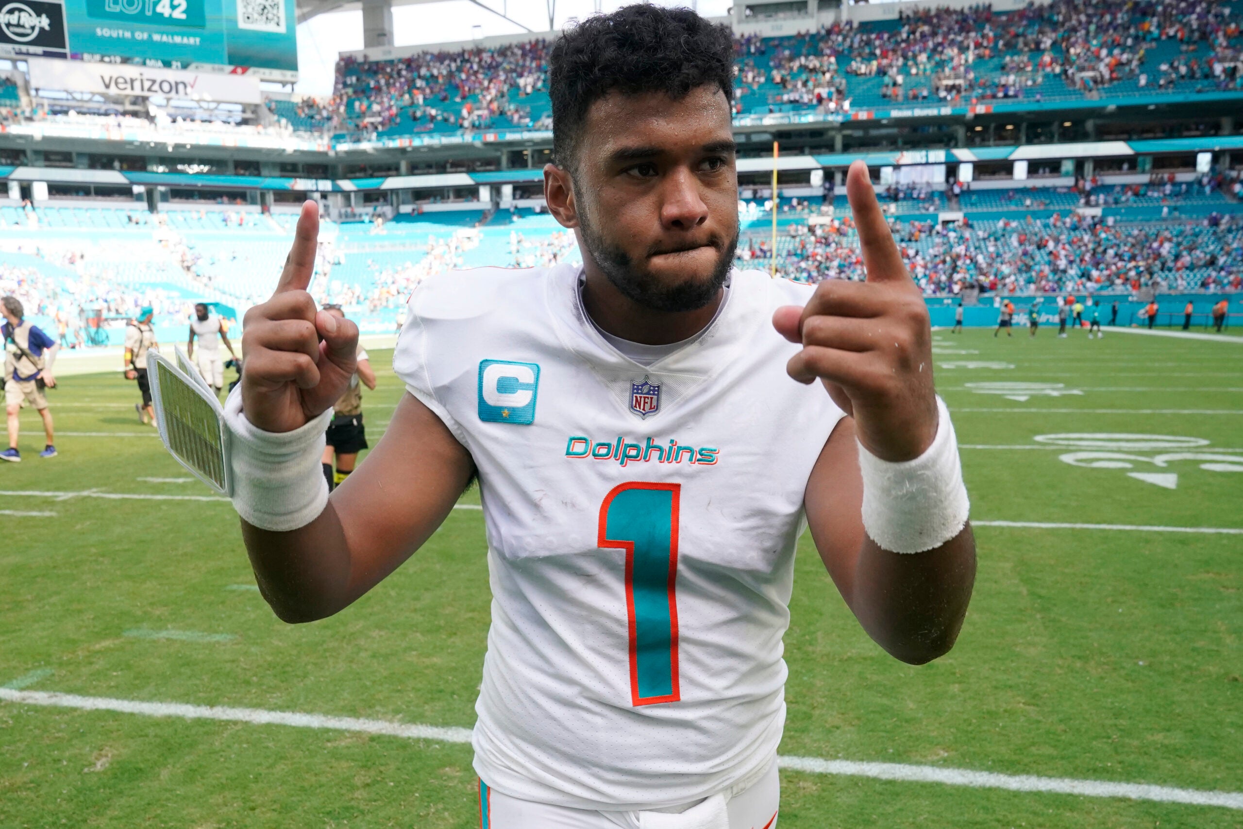 Miami Dolphins quarterback Tua Tagovailoa (1) gestures at the end of an NFL football game against the Buffalo Bills, Sunday, Sept. 25, 2022, in Miami Gardens, Fla.