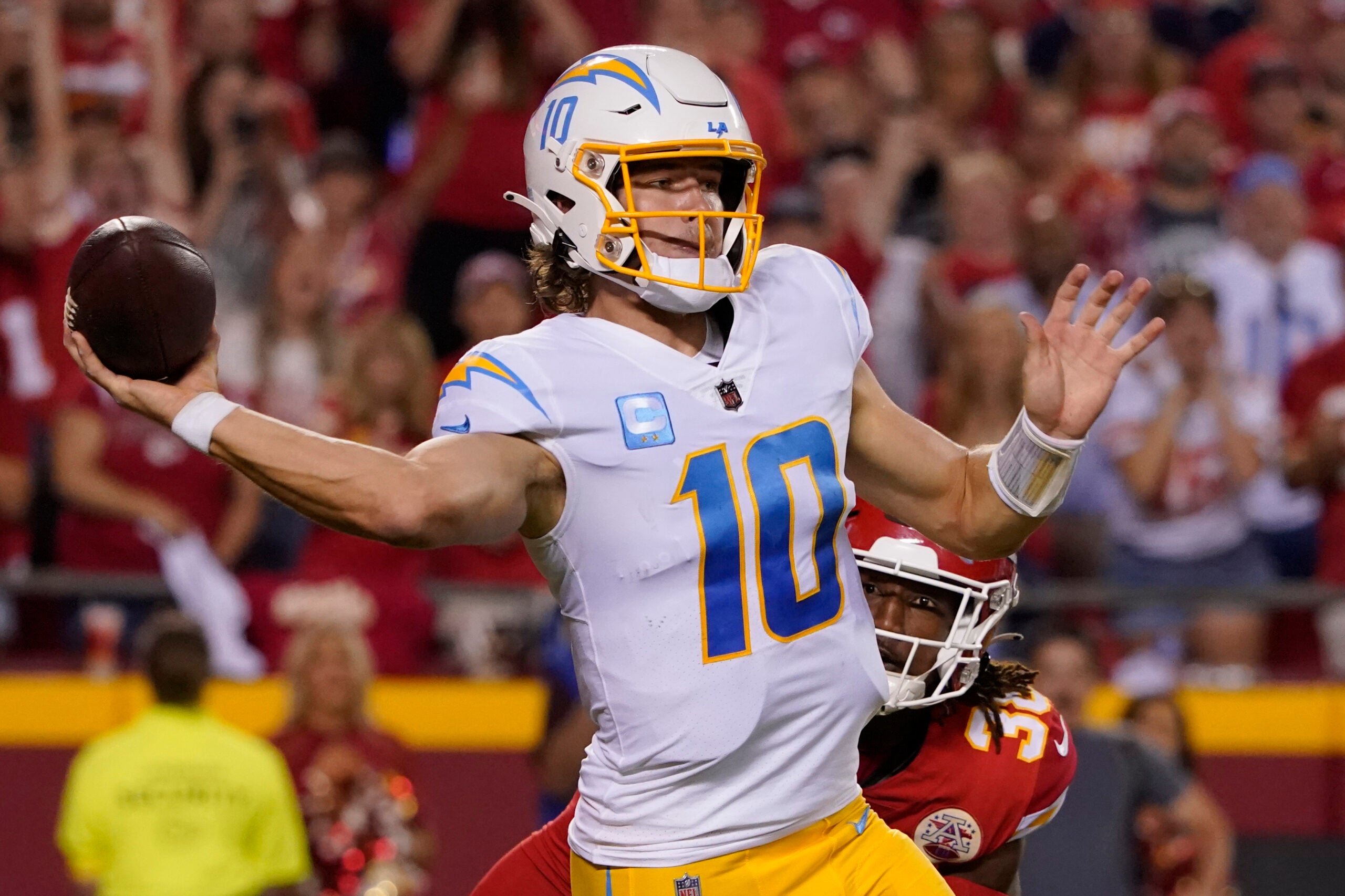 Los Angeles Chargers quarterback Justin Herbert throws during the second half of an NFL football game against the Kansas City Chiefs Thursday, Sept. 15, 2022, in Kansas City, Mo.