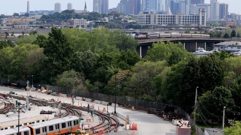 Orange Line trains are seen in the yard at Wellington Station.