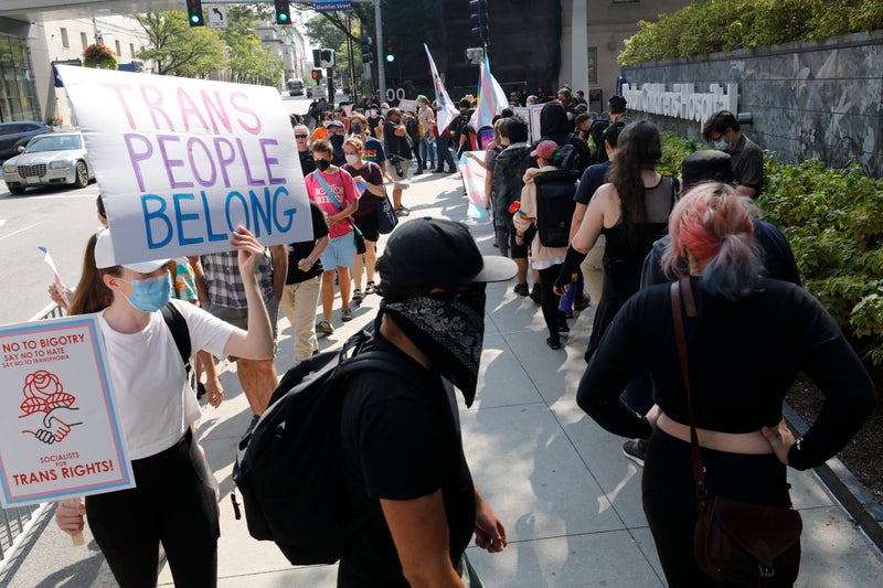 Fewer than 10 anti-trans protesters met by 100s of counter-protesters ...