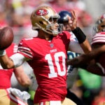 San Francisco 49ers quarterback Jimmy Garoppolo (10) passes against the Seattle Seahawks during the first half of an NFL football game in Santa Clara, Calif., Sunday, Sept. 18, 2022.