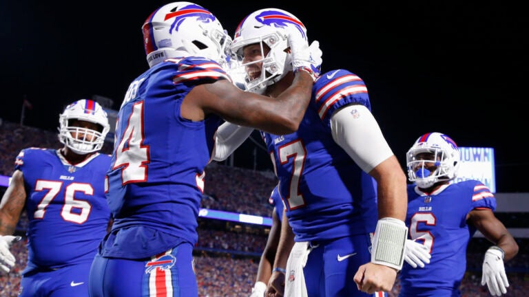 Buffalo Bills' Stefon Diggs, second from left, celebrates with quarterback Josh Allen, second from right, after they connected for a touchdown during the second half of an NFL football game against the Tennessee Titans, Monday, Sept. 19, 2022, in Orchard Park, N.Y.