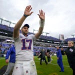 Buffalo Bills quarterback Josh Allen (17) waves to fans as he leaves the field after a 23-20 win over the Baltimore Ravens in an NFL football game Sunday, Oct. 2, 2022, in Baltimore.