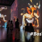 Audiences view “The Entombment of Christ” by Caravaggio, featured in “Immersive Vatican.”