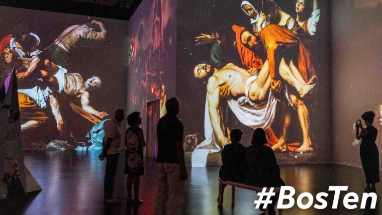 Audiences view “The Entombment of Christ” by Caravaggio, featured in “Immersive Vatican.”