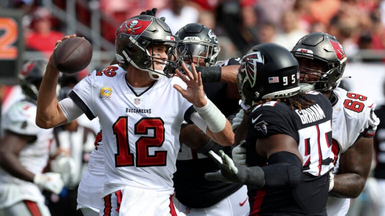 Tom Brady benefits from controversial roughing-the-passer penalty as  Buccaneers snap losing streak with win over Falcons - KESQ