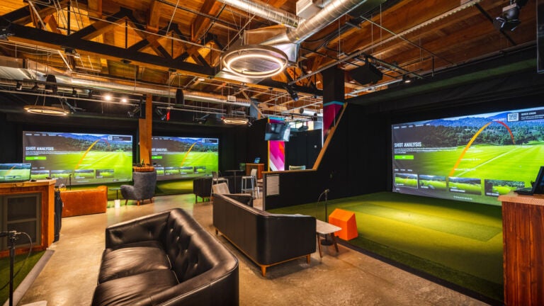 Five Iron Golf - Grand Central A two-story indoor golf venue is opening in Downtown Boston