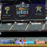 A wide shot of the right-field scoreboard in Houston, displaying the logo of the 2022 World Series.