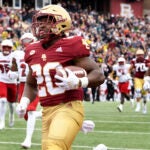 Boston College running back Alex Broome runs into the endzone to score against Louisville during the first half of an NCAA college football game Saturday, Oct. 1, 2022, in Boston.