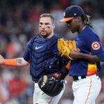 Houston's Christian Vázquez talks to relief pitcher Rafael Montero