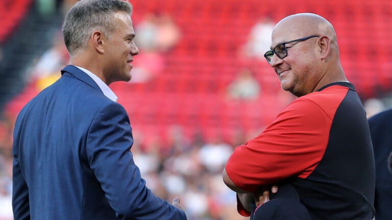 Theo Epstein and Terry Francona exchange smiles as they chat before the David Ortiz Hall of Fame ceremony at Fenway Park.