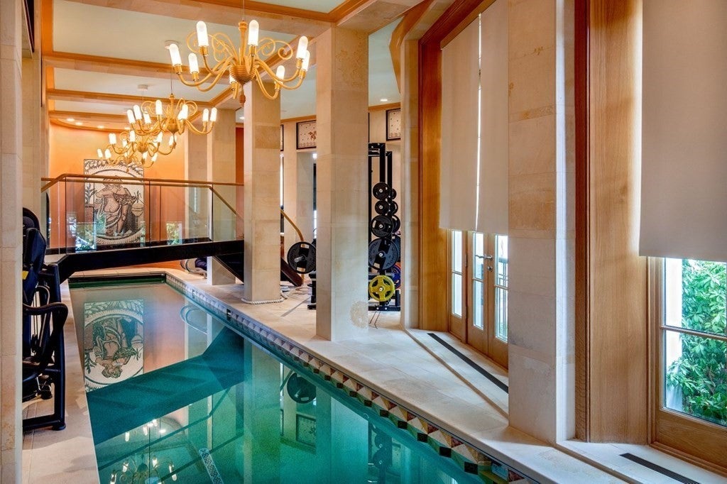 16 Boardman Avenue indoor lane pool with the gym and a path above the pool.
