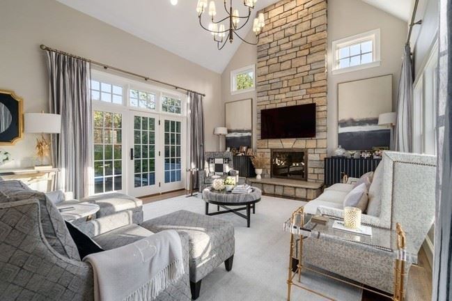 23 Stonefield Ct Needham Lounge with floor-to-ceiling stone fireplace.