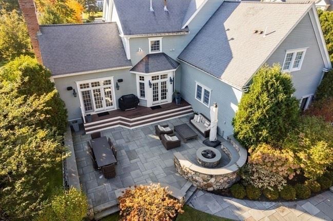 23 Stonefield Ct Needham outdoor space from birds eye view with firepit and outdoor seating. 