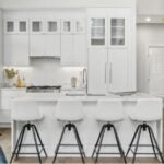 The 154 Thorndike kitchen with and island and white cabinets.