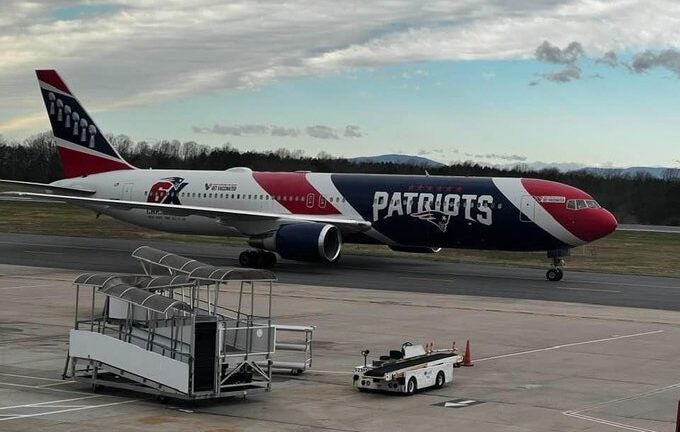 Patriots team plane takes University of Virginia athletes to