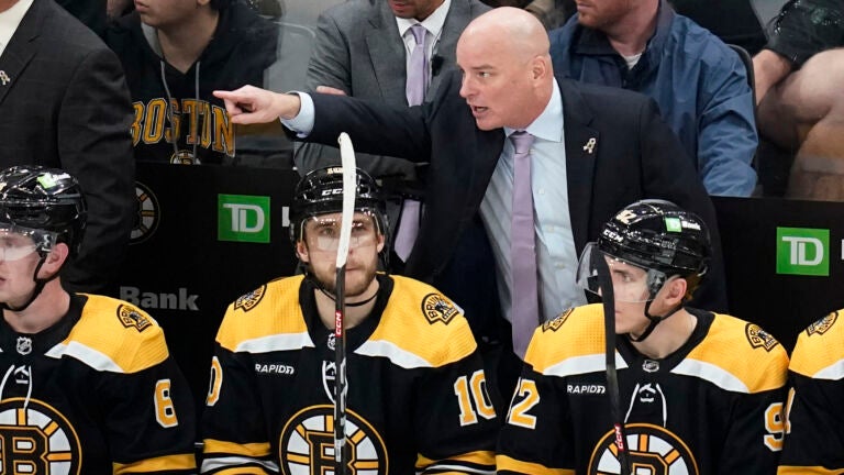 McAvoy scores in OT, Bruins beat Flames for 8th win a row