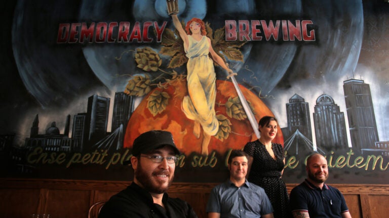 Boston , MA - 07/10/18 - (l to r, all cq) Chef Ben Waxler, head brewer Jason Taggart, general manager Courtney Bolinger, and CEO James Razsa at Democracy Brewing in Downtown Crossing, which has been open less than a week. (Lane Turner/Globe Staff) Reporter: (Devra First) Topic: (15quickbite)