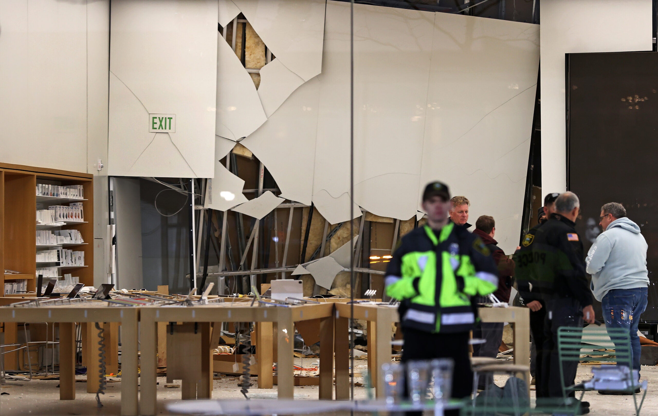 Driver charged in deadly Apple store crash said his foot got stuck