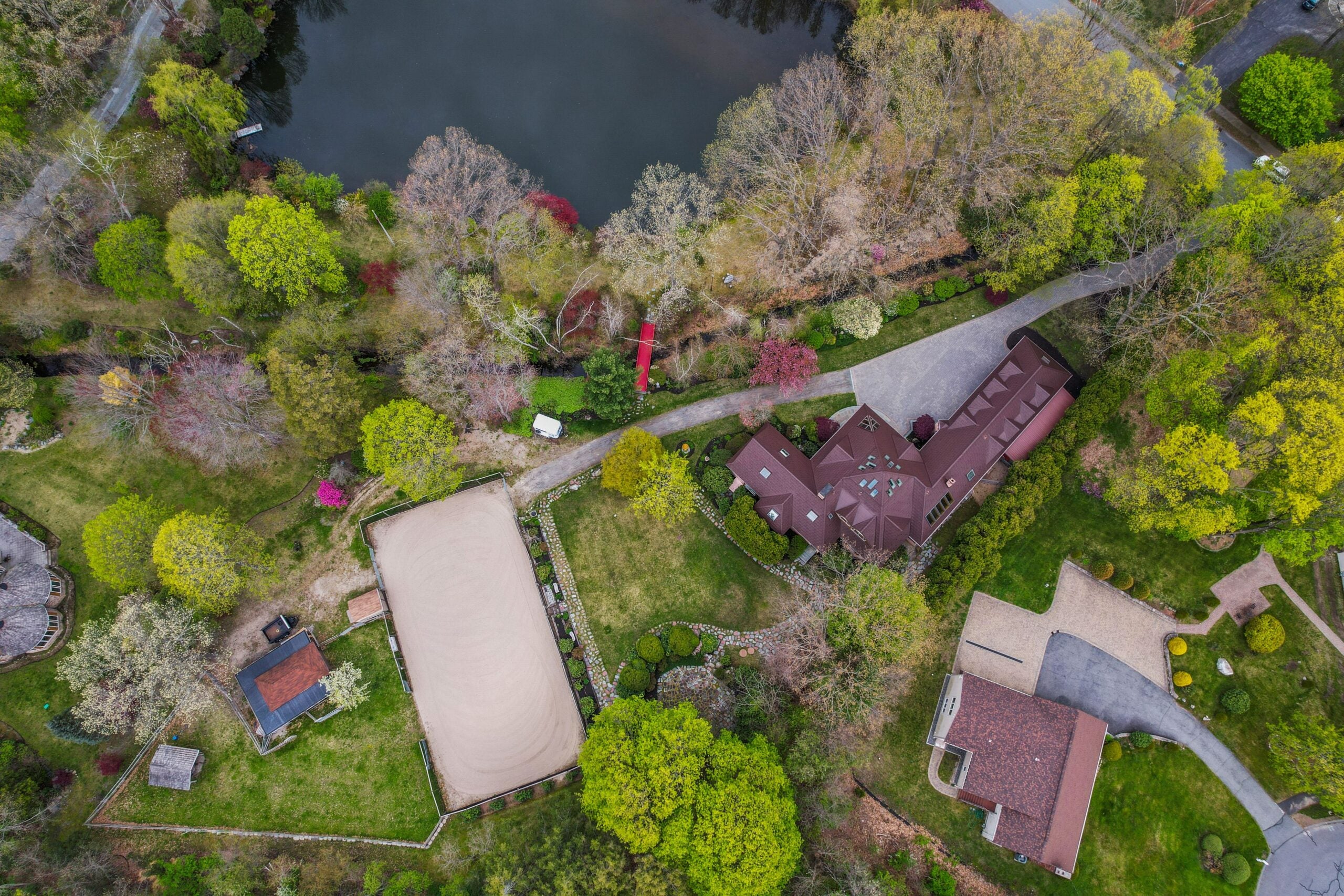 12 Solomon Pierce Road birds eye view of pond, home and horse ring.