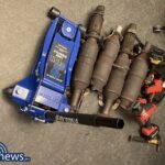 alt = four catalytic converters, a blue jack, and a power tool recovered by Boston police in Roxbury