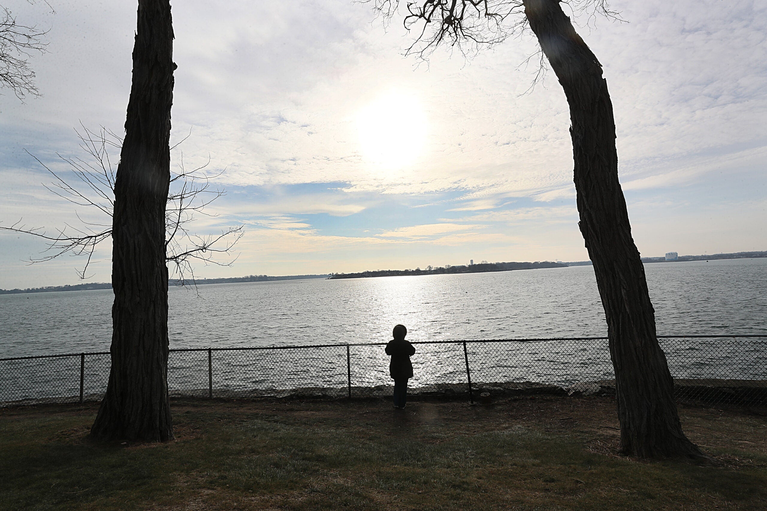 People stroll through Lynch Park in Beverly.