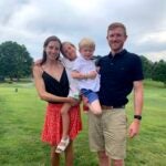 Price Meropol McMahon (left), her husband, Jimmy McMahon, and their children, Rosalie and James, on the green at Woodland Golf Club.