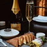 A stylised photo of Row 34's New Year's Eve tradition of caviar and Krug