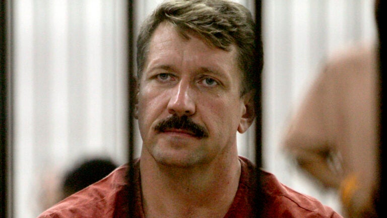 Viktor Bout looks out from inside a detention center while waiting for a hearing on his extradition to the United States on May 19, 2009, in Bangkok, Thailand.