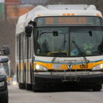 Boston, MA - 03/01/22 - A 28 bus heads inbound to Ruggles Station on Blue Hill Avenue. Riders took advantage of the start of a new two-year program that makes MBTA bus lines 23, 28, and 29 all free of charge. (Lane Turner/Globe Staff) Reporter: (Taylor Dolven) Topic: (02wu)